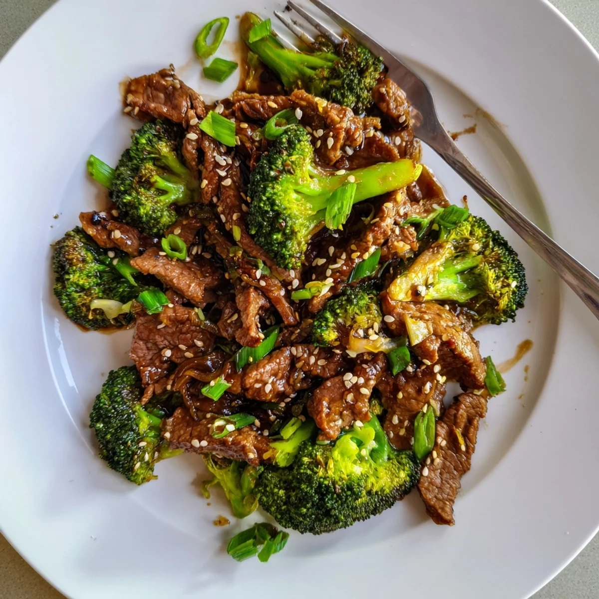 Quick and delicious Easy Beef and Broccoli Stir-Fry served over fluffy rice or noodles.