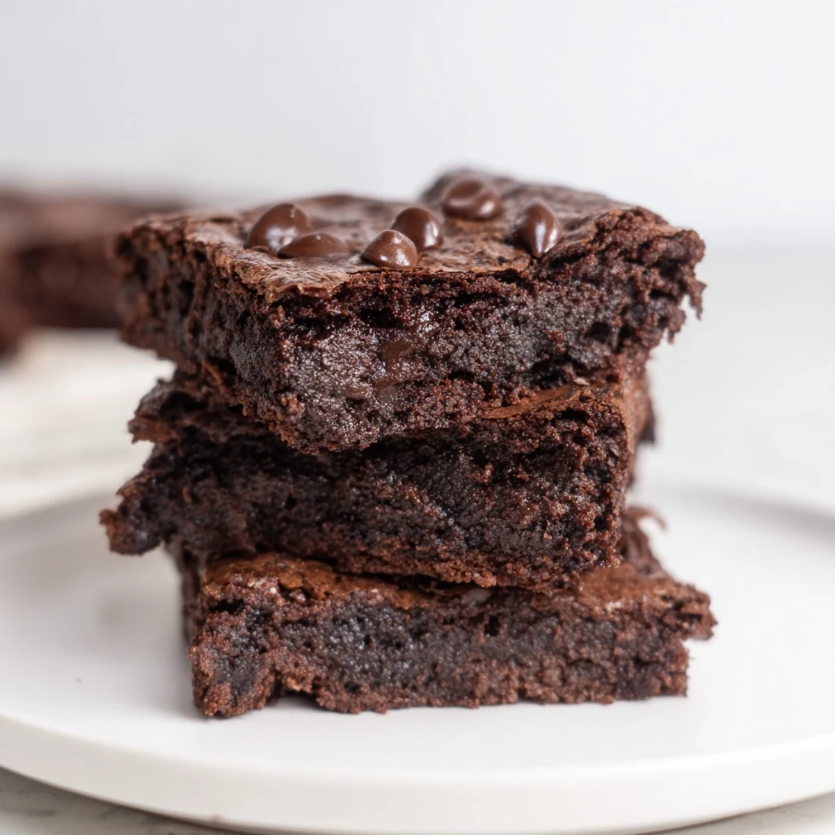 A pan of freshly baked Black Bean Brownies, showcasing a moist, delicious texture.