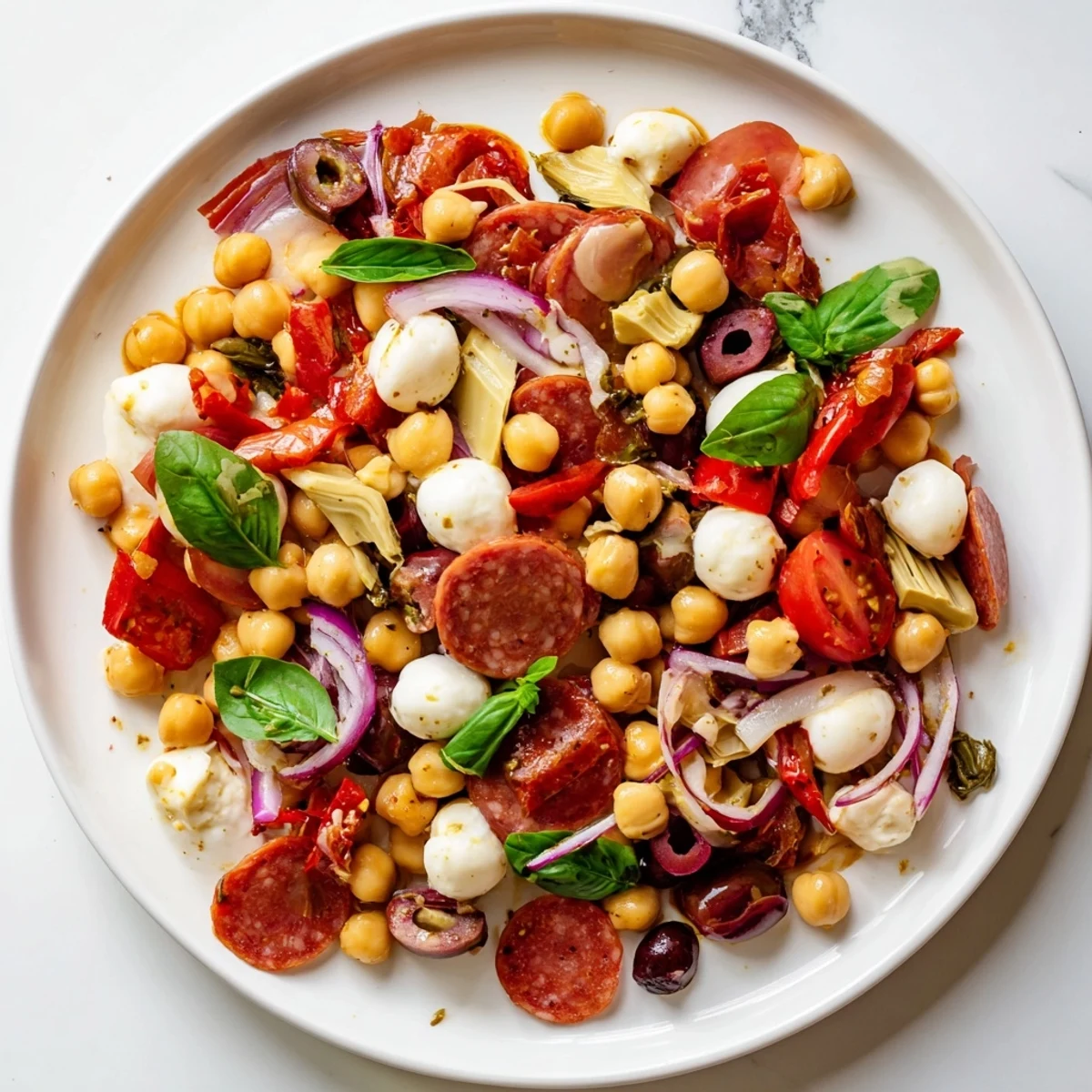 Fresh, flavorful Antipasto Chickpea Salad, showcasing tender chickpeas and savory pepperoni in every bite.