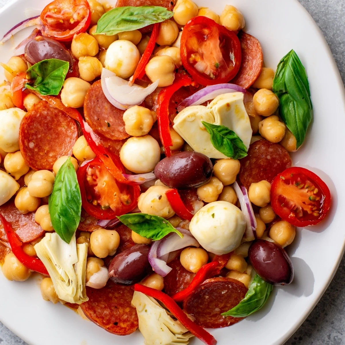 A close-up shot of the delicious Antipasto Chickpea Salad, perfect for a light lunch or appetizer.