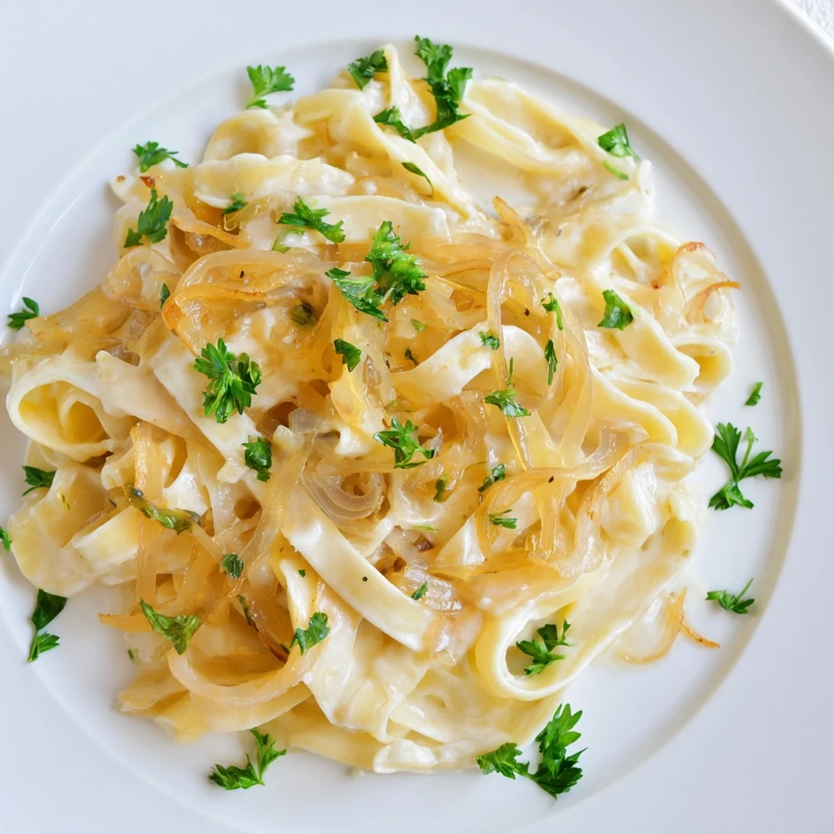 Golden-brown one-pot French Onion Pasta, cooked until creamy, topped with bubbling melted cheese for dinner.