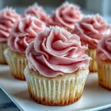 Bridal shower vanilla cupcakes with pink frosting, light and fluffy, topped with creamy pastel buttercream.
