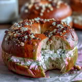 Golden-baked Greek yogurt bagels topped with savory everything bagel seasoning, offering a protein-rich, satisfying bite.  
