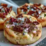 Buttery shortbread cookies decorated with edible flowers, perfect for elegant Mothers Day gifting.  