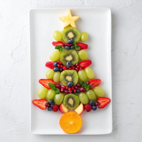 Brightly colored Quick Christmas Tree Fruit Platter, perfect for a healthy and festive holiday appetizer.