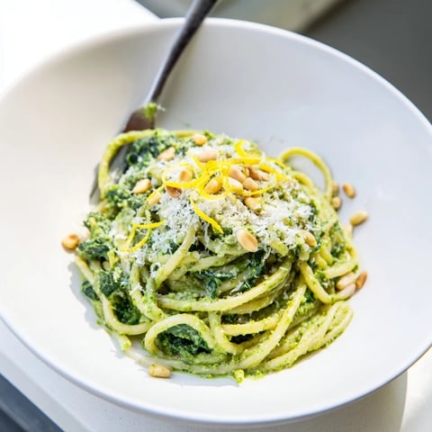 Green pea and spinach elf pasta, a bright green plate with creamy, protein-packed noodles ready to serve.