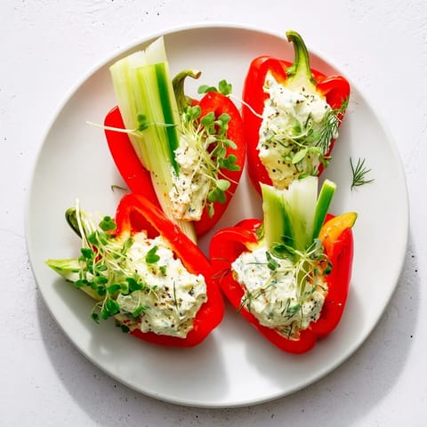 Vibrant Blooming Tulip Veggie Cups, a refreshing appetizer with colorful vegetables and flavorful cheese filling.