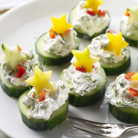 Bright, creamy Holiday Star Cucumber Bites are a delightful appetizer, ready for a holiday celebration.