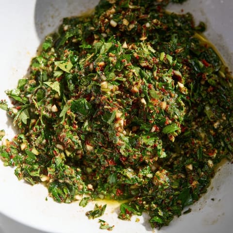 Vibrant Moroccan Chermoula Marinade with fresh herbs and spices ready to infuse fish with delicious flavor.